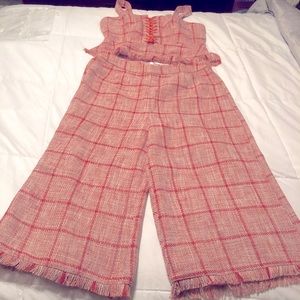 Lace up tweed top and wide leg tweed pants.